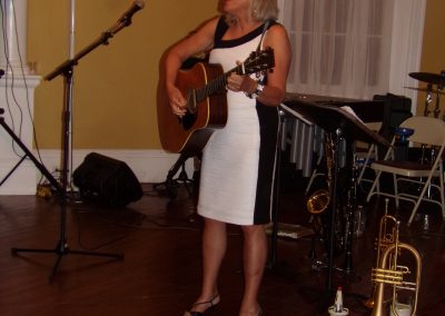 Katherine ("Clissy") Funkhouser entertained at the Ball with her singing of "West Viginia you are my Home" by Ms. Hazel Dirkens.